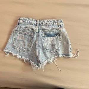 SHEIN light wash ripped shorts